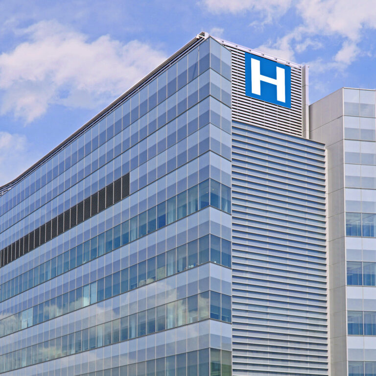 Building with large H sign for hospital
