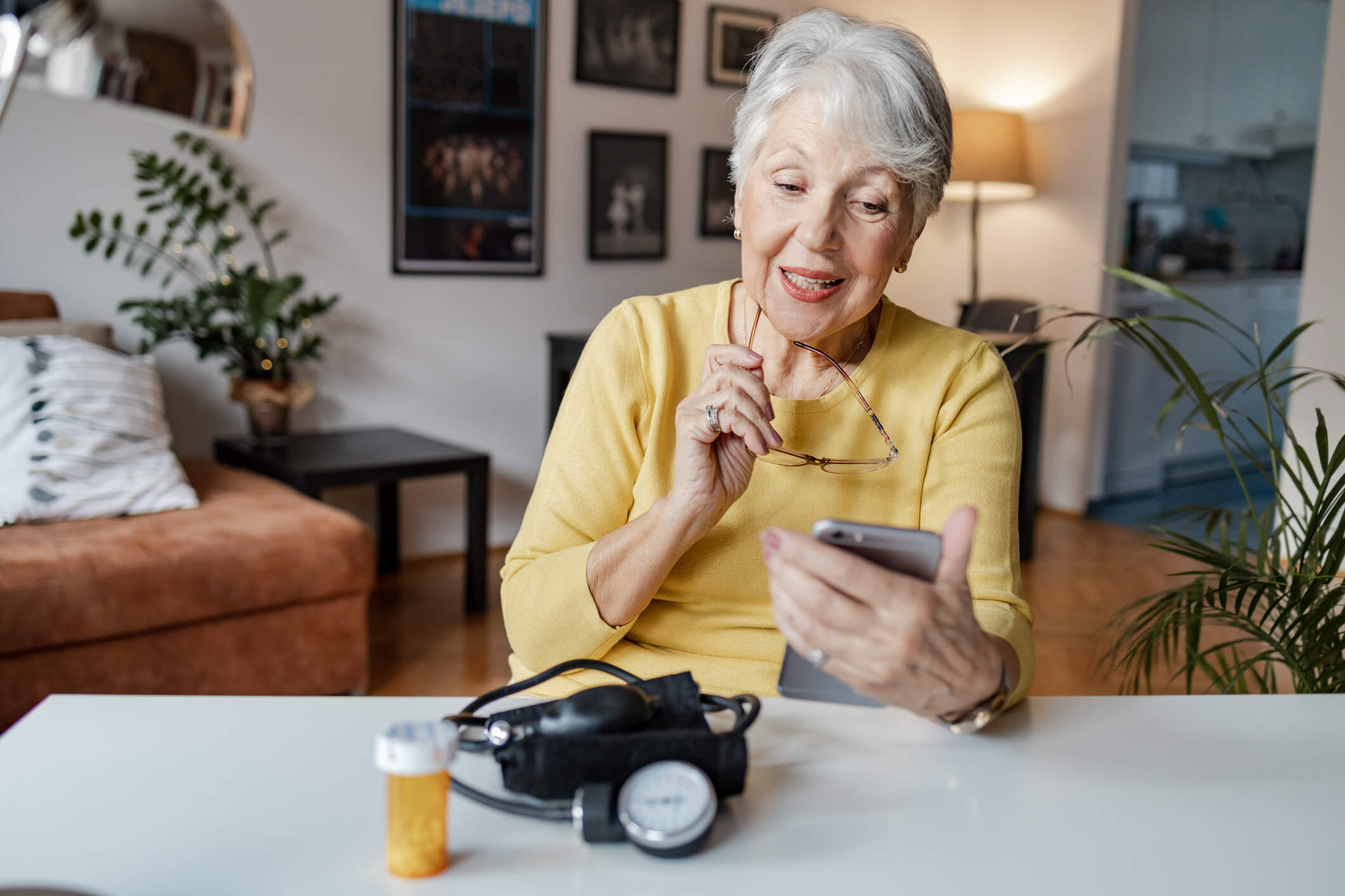 Older woman looking at her cell phone