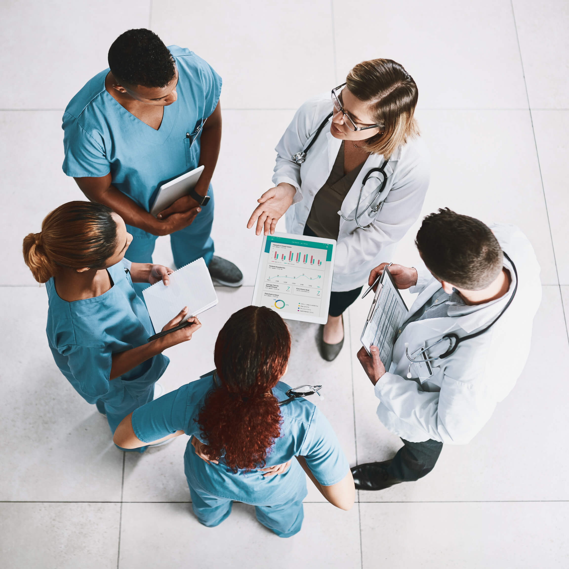 A group of doctors and nurses having a meeting